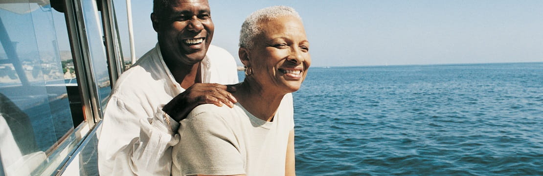 Senior Couple Standing on Deck on a Boat